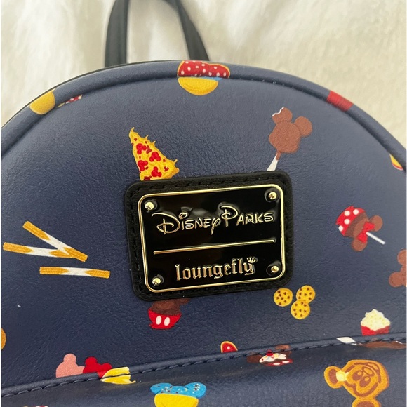 Disney Loungeparks mini blue multicolor backpack - Picture 1 of 7